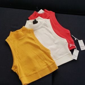 3 mock neck sleeveless tops